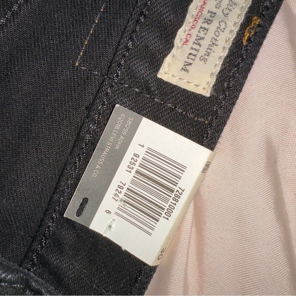 Levi’s 501 high waisted distressed raw hem black jean shorts Sz 30 NWT - Picture 7 of 7